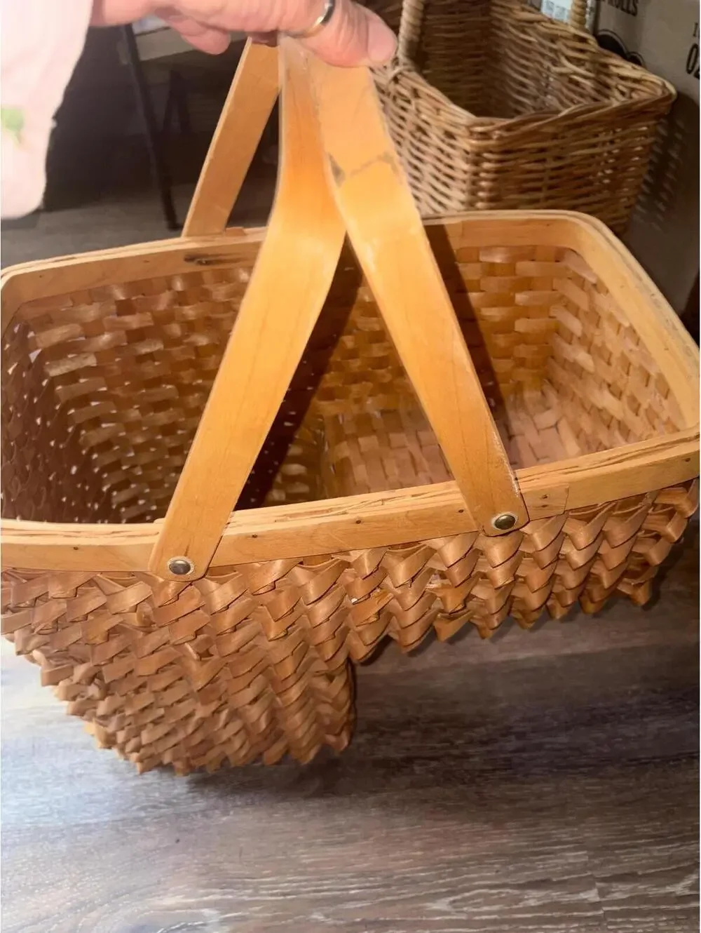 Vintage hand-woven wooden stair-step basket with curly splint decorations